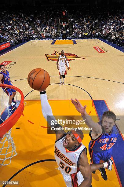 Corey Maggette of the Golden State Warriors shoots a layup against David Lee of the New York Knicks during the game at Oracle Arena on April 2, 2010...