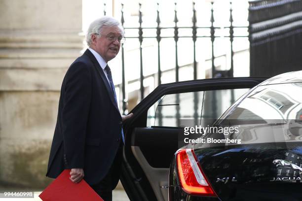 David Davis departs number Downing Street to attend a weekly questions and answers session in Parliament in London, U.K., on Wednesday, May 9, 2018....