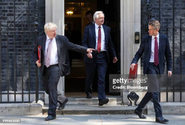 Boris Johnson, U.K. Foreign secretary, left, David Davis, U.K. Exiting the European Union secretary, centre, and Gavin Williamson, U.K. Defence...