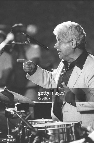 Picture dated 10 July 1983 showing legendary Puerto Rican "drum king" Tito Puente performing on the French Riviera in Nice. Tito Puente died early 01...