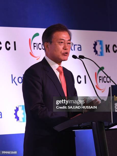 South Korea's President Moon Jae-in delivers a speech at the 'India-Korea Business Forum' in New Delhi on July 9, 2018. - The event was organised by...