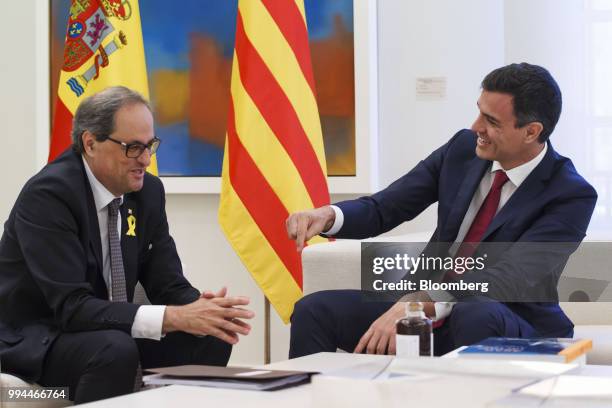 Joaquim Torra, Catalonia's president, left, reacts during a meeting with Pedro Sanchez, Spain's prime minister, at Moncloa palace in Madrid, Spain,...