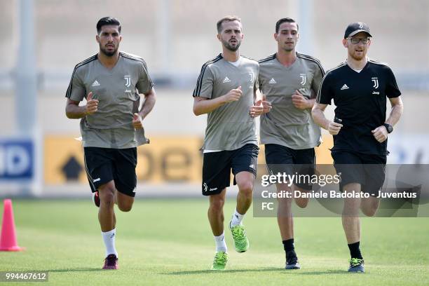 Emre Can , Miralem Pjanic , Mattia De Sciglio and Enrico Maffei during a Juventus training session at Juventus Training Center on July 9, 2018 in...