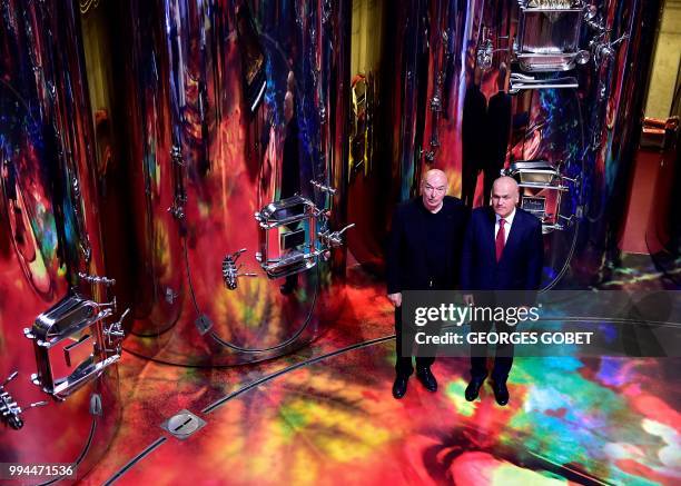 French architect Jean Nouvel and Russian business man Andrei Filatov, owner of the Chateau La Grace Dieu des Prieurs estate, pose inside the estate...