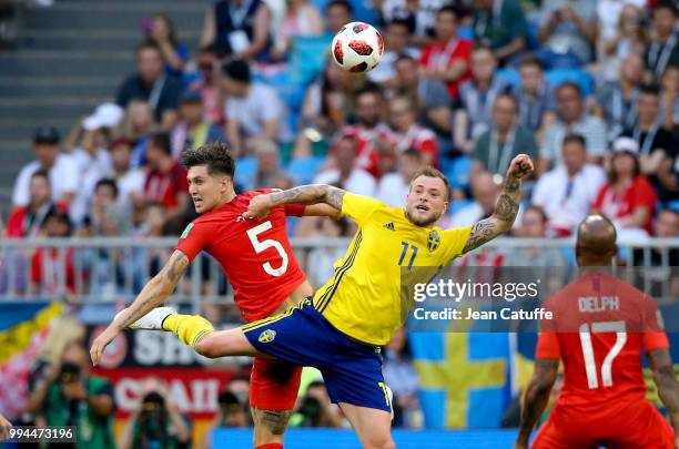 John Stones of England, John Guidetti of Sweden during the 2018 FIFA World Cup Russia Quarter Final match between Sweden and England at Samara Arena...