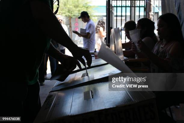 Person votes during Mexico General Elections on July 1, 2018 in Mexicali, Mexico. Andrés Manuel López Obrador, popularly known as AMLO, has won...