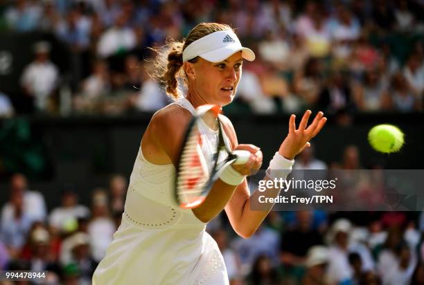 Kristina Mladenovic of France in action against Serena Williams of the United States in the third round of the ladies singles at the All England Lawn...