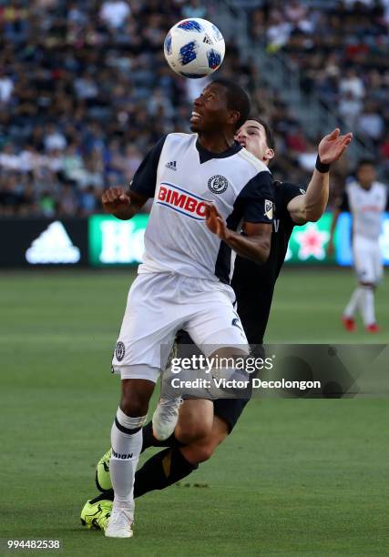 Ray Gaddis of Philadelphia Union wins the ball from Aaron Kovar of Los Angeles FC during the MLS match at Banc of California Stadium on June 30, 2018...