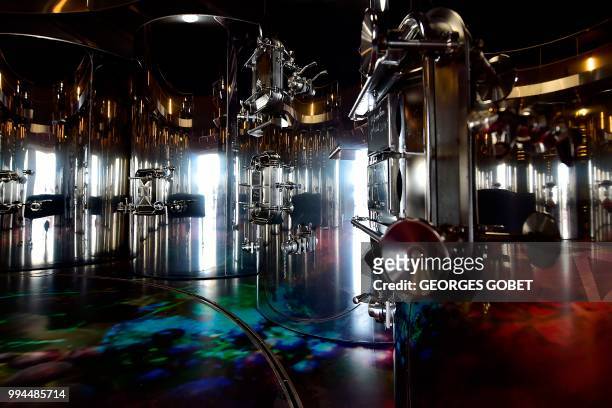 Picture taken on July 5, 2018 in Saint Emilion near Bordeaux shows an inside view of a new cuvier designed by French architect Jean Nouvel at the...