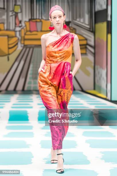 July 09: A model showcases designs by Jaish Parathalingam Jayesingha during Hong Kong Fashion Week Spring/ Summer 2018 at Hong Kong Convention and...