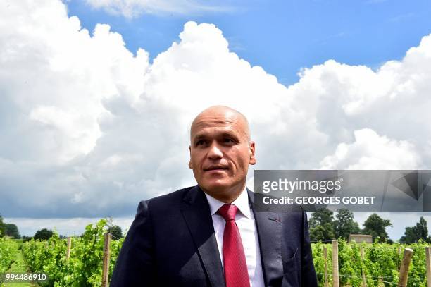 Russian business man Andrei Filatov, owner of the Chateau La Grace Dieu des Prieurs wine estate, arrives on the inauguration day on July 5, 2018 in...