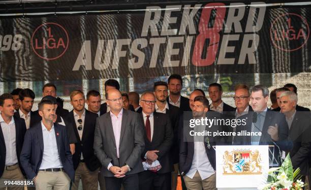 July 2018, Germany, Nuremberg: Markus Soeder of the Christian Social Union , Premier of Bavaria, delivers a speech during a reception on the occasion...