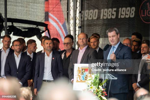 July 2018, Germany, Nuremberg: Markus Soeder of the Christian Social Union , Premier of Bavaria, delivers a speech during a reception on the occasion...