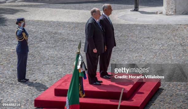 Portuguese President Marcelo Rebelo de Sousa and Shah Karim Al-Hussaini, Prince Aga Khan , listen to national anthems in Belem presidential Palace on...