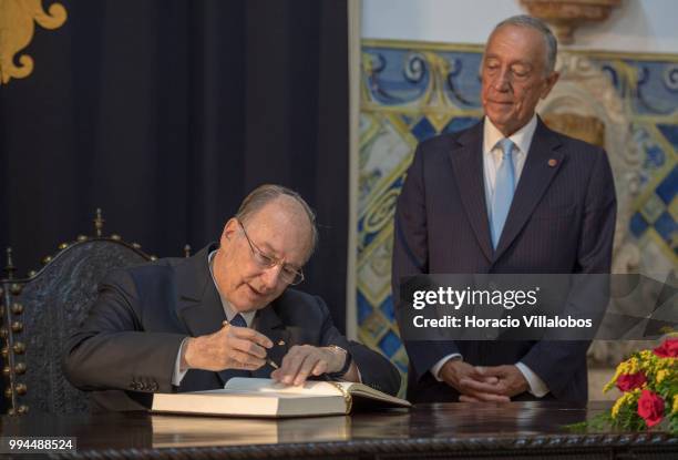 Portuguese President Marcelo Rebelo de Sousa looks at Shah Karim Al-Hussaini, Prince Aga Khan , signing the presidential honor book before the start...