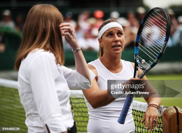 Dominika Cibulkova of Slovakia talks to the umpire in her Ladies' Singles fourth round match against Su-Wei Hsieh of Chinese Taipei on day seven of...