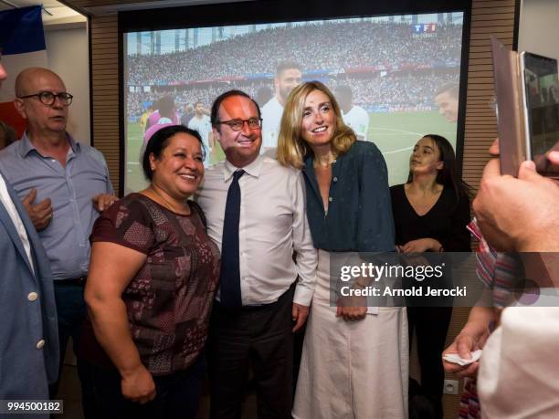 Former French President Francois Hollande and Julie Gayet pose with fans during The Uruguay v France: Quarter Final at the Socialist Party...