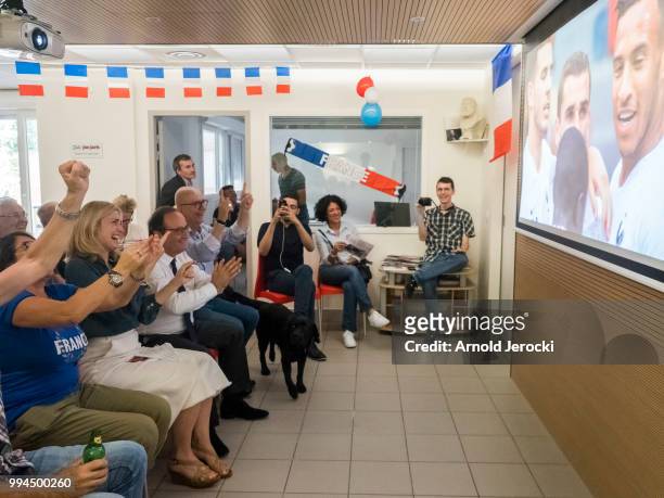 Former French President Francois Hollande and Julie Gayet watch World Cup Russia Quarter Final match between Uruguay and France at the Socialist...