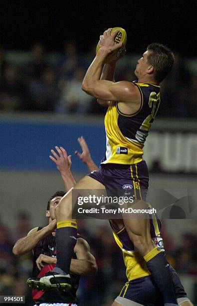 Glen Jakovich for the West Coast Eagles marks the ball, during round 21 of the AFL season, West Coast Eagles v Essendon Bombers played at Subiaco...