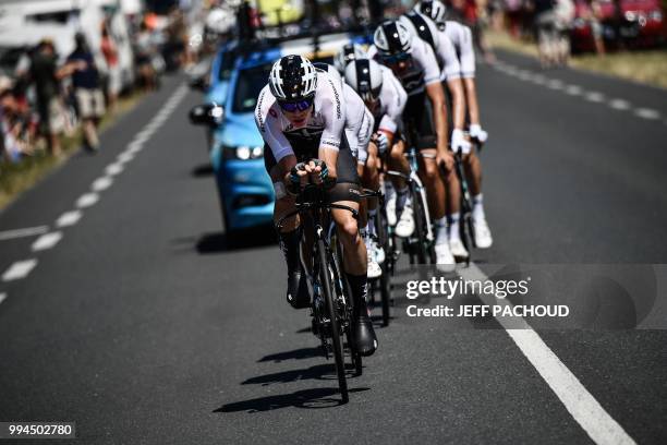 Great Britain's Christopher Froome and riders of Great Britain's Team Sky cycling team pedal on the route during a training session, prior to the...