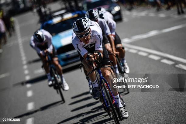 Great Britain's Geraint Thomas and riders of Great Britain's Team Sky cycling team pedal on the route during a training session, prior to the third...