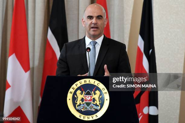 Swiss President Alain Berset addresses a joint press conference with his Kenyan counterpart at the State House in Nairobi on July 9 during Berset's...