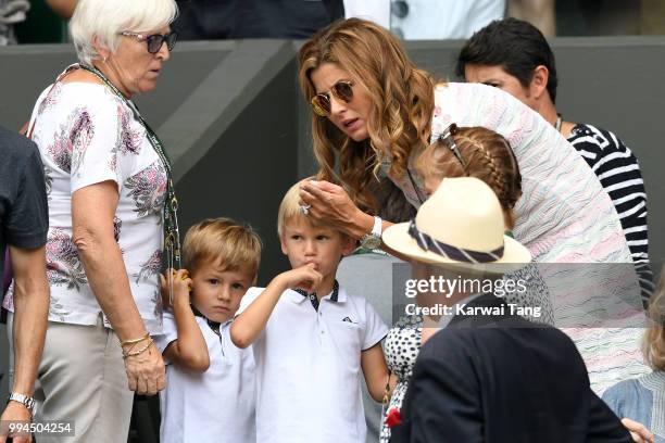 Miroslava Federer-Vavrinec with her twin sons Lennart and Leo Federer attend day seven of the Wimbledon Tennis Championships at the All England Lawn...
