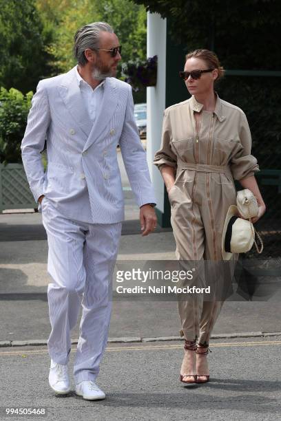 Stella McCartney and Alasdhair Willis seen arriving at Wimbledon Day 7 on July 9, 2018 in London, England.