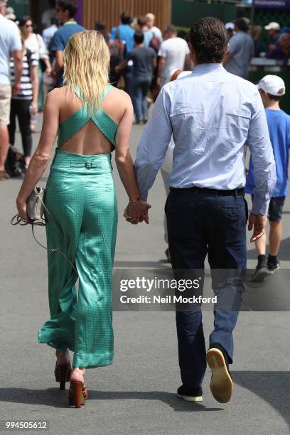 Vito Schnabel and Amber Heard seen arriving at Wimbledon Day 7 on July 9, 2018 in London, England.