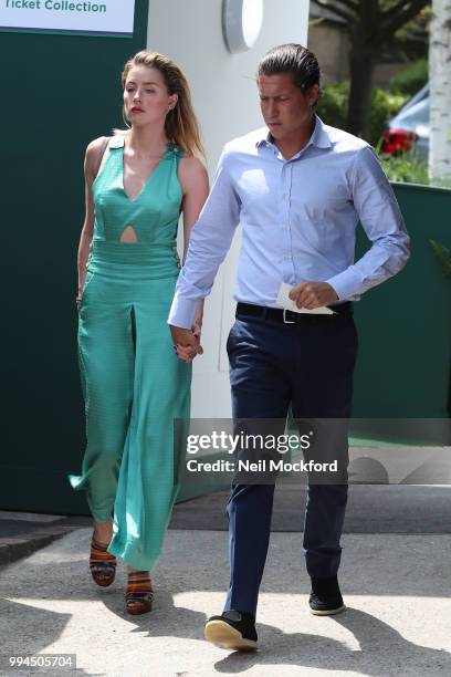 Vito Schnabel and Amber Heard seen arriving at Wimbledon Day 7 on July 9, 2018 in London, England.