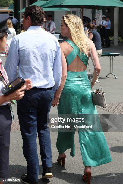 Vito Schnabel and Amber Heard seen arriving at Wimbledon Day 7 on July 9, 2018 in London, England.