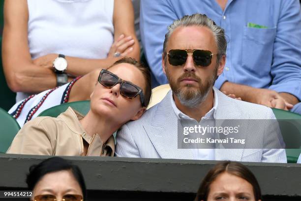 Stella McCartney and her husband Alasdhair Willis attend day seven of the Wimbledon Tennis Championships at the All England Lawn Tennis and Croquet...