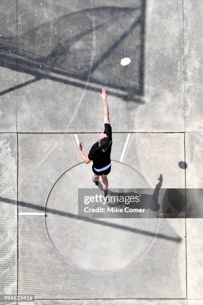 An athlete throws the shot put during the Division II Men's and Women's Outdoor Track and Field Championships held at the Irwin Belk Complex on May...