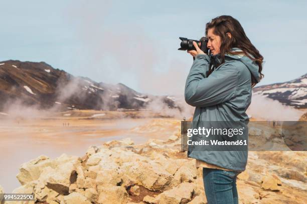 iceland, hverarond field, female photographer - namafjall stock pictures, royalty-free photos & images