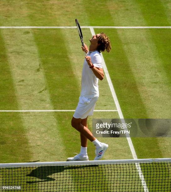 Alexander Zverev of Germany celebrates beating Taylor Fritz of the United States in the third round of the gentlemen's singles at the All England...
