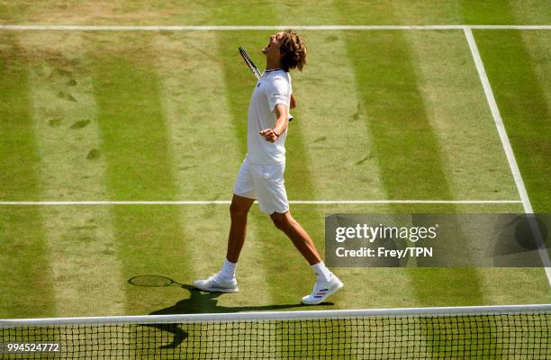 Alexander Zverev of Germany celebrates beating Taylor Fritz of the United States in the third round of the gentlemen's singles at the All England...