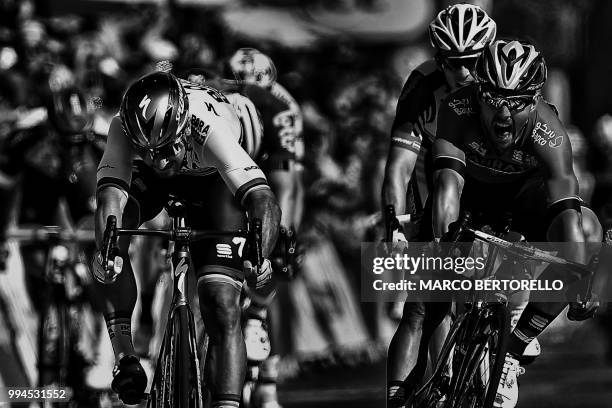 Slovakia's Peter Sagan crosses the finish line ahead of Italy's Sonny Colbrelli and France's Arnaud Demare to win the second stage of the 105th...