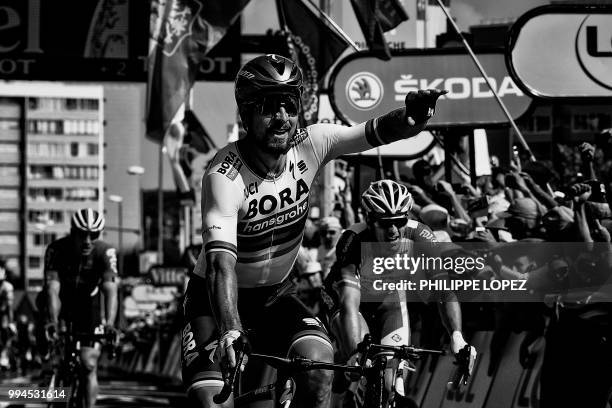 Slovakia's Peter Sagan celebrates after winning the second stage of the 105th edition of the Tour de France cycling race between...