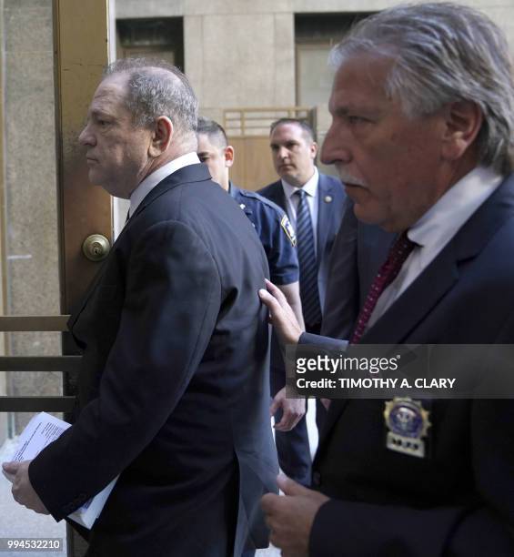 Harvey Weinstein arrives at Manhattan Criminal Court July 9, 2018 in New York, for arraignment on charges alleging he committed a sex crime against a...
