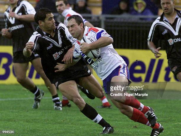Matt Rua of New Zealand hunts down Renaud Guigue of France during the Rugby League Test Match between New Zealand and France at Ericsson Stadium,...