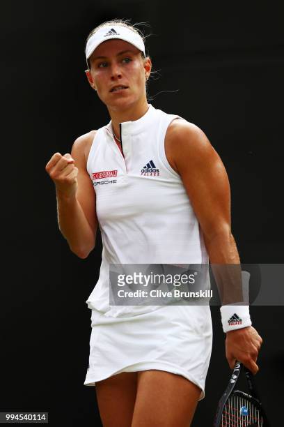 Angelique Kerber of Germany celebrates a point against Belinda Bencic of Switzerland during their Ladies' Singles fourth round match on day seven of...