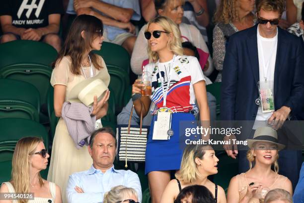 Alexa Chung, Poppy Delevingne and her husband James Cook attend day seven of the Wimbledon Tennis Championships at the All England Lawn Tennis and...