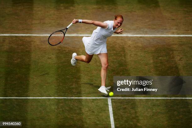 Alison Van Uytvanck of Belgium plays a backhand slice against Daria Kasatkina of Russia during their Ladies' Singles fourth round match on day seven...