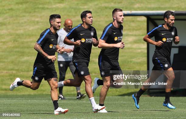 Matteo Politano, Eder Citadin Martins, Milan Skriniar and Antonio Candreva of FC Internazionale run during the FC Internazionale training session at...