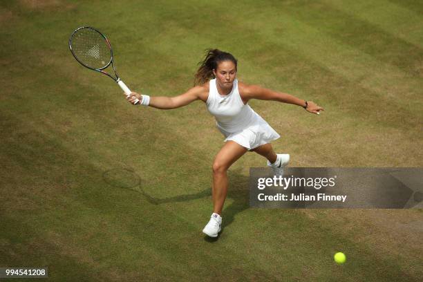 Daria Kasatkina of Russia plays a forehand against Alison Van Uytvanck of Belgium during their Ladies' Singles fourth round match on day seven of the...