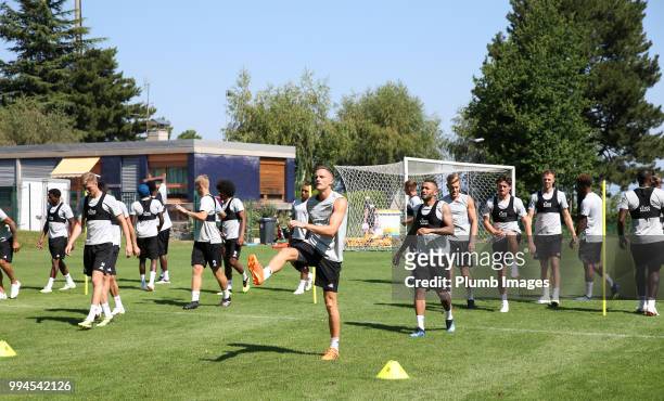 Andy King leads the players during the Leicester City pre-season training camp on July 09, 2018 in Evian, France.