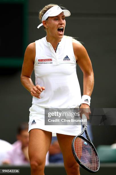 Angelique Kerber of Germany reacts against Belinda Bencic of Switzerland during their Ladies' Singles fourth round match on day seven of the...