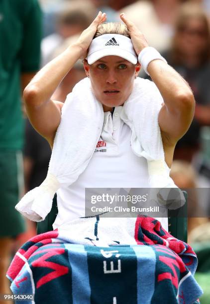 Angelique Kerber of Germany cools down between games against Belinda Bencic of Switzerland during their Ladies' Singles fourth round match on day...
