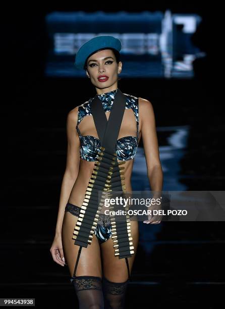 Model displays an outfit of Spanish designer Andres Sarda Spring/Summer 2019 collection during the Madrid's Mercedes Benz Fashion Week on July 09,...