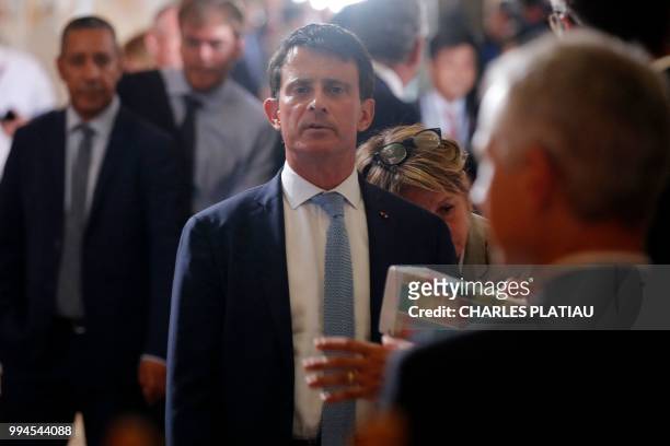 Member of parliament Manuel Valls arrives to attend a special session of the upper and lower houses of the French parliament in Versailles near...